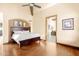 Spacious main bedroom with hardwood floors and access to additional sitting area at 6302 E Monte Cristo Ave, Scottsdale, AZ 85254