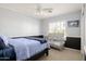 Cozy bedroom with a crib and plenty of space at 6302 E Monte Cristo Ave, Scottsdale, AZ 85254