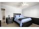 Charming bedroom with dark-wood bed frame and nightstand at 6302 E Monte Cristo Ave, Scottsdale, AZ 85254
