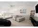 Multipurpose bedroom with bunk bed, comfy chair, and media at 6302 E Monte Cristo Ave, Scottsdale, AZ 85254