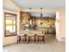 Spacious kitchen with island and light wood cabinets at 6302 E Monte Cristo Ave, Scottsdale, AZ 85254