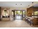 Open kitchen with access to backyard and pool through French doors at 6302 E Monte Cristo Ave, Scottsdale, AZ 85254