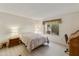 Guest bedroom with a double bed and a writing desk at 649 S Arrowwood Way, Mesa, AZ 85208