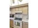 View of kitchen appliances, including a range and oven at 649 S Arrowwood Way, Mesa, AZ 85208