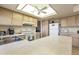 Bright kitchen features ample cabinetry and a spacious countertop at 649 S Arrowwood Way, Mesa, AZ 85208