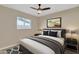 Bedroom with a queen-size bed and modern decor at 7607 N 42Nd Ln, Phoenix, AZ 85051