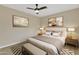 Spacious bedroom with a king-size bed and modern decor at 7607 N 42Nd Ln, Phoenix, AZ 85051