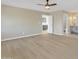 Bright bedroom with hardwood floors and a view of the bathroom at 7607 N 42Nd Ln, Phoenix, AZ 85051