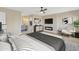 Main bedroom with fireplace, en-suite bathroom, and sitting area at 7607 N 42Nd Ln, Phoenix, AZ 85051