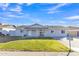 Charming single story home with a landscaped front yard and covered porch at 7607 N 42Nd Ln, Phoenix, AZ 85051