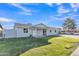 Updated single-story home showcasing a modern facade and spacious lawn at 7607 N 42Nd Ln, Phoenix, AZ 85051