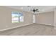 Bright and airy living room with hardwood floors and ceiling fan at 7607 N 42Nd Ln, Phoenix, AZ 85051