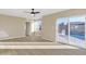 Living room with sliding doors leading to a refreshing pool area at 7607 N 42Nd Ln, Phoenix, AZ 85051