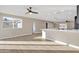 Open concept living room with kitchen views and hardwood floors at 7607 N 42Nd Ln, Phoenix, AZ 85051