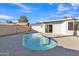 Refreshing kidney-shaped pool and patio area at 7607 N 42Nd Ln, Phoenix, AZ 85051