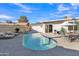 Relaxing kidney-shaped pool with patio furniture at 7607 N 42Nd Ln, Phoenix, AZ 85051