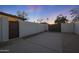 Gated backyard access and adjacent concrete pad at 8366 S Grandview Ave, Tempe, AZ 85284