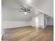 Spacious bedroom featuring vaulted ceilings, a ceiling fan, and light wood flooring at 8366 S Grandview Ave, Tempe, AZ 85284