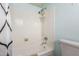 Clean bathroom with tub and shower, plus updated fixtures at 9270 W Morrow Dr, Peoria, AZ 85382