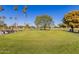 Golf course putting green with golf carts at 9270 W Morrow Dr, Peoria, AZ 85382