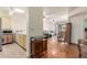 Open kitchen features light wood cabinets, tile floors, and stainless steel appliances at 9270 W Morrow Dr, Peoria, AZ 85382