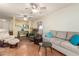 Open living room with adjacent kitchen and dining area at 9270 W Morrow Dr, Peoria, AZ 85382