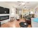 Open living room with adjacent kitchen and dining area at 9270 W Morrow Dr, Peoria, AZ 85382
