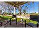 Private patio overlooking a lush green golf course at 9270 W Morrow Dr, Peoria, AZ 85382