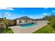 The backyard offers a private pool, patio area, and lush landscaping for outdoor enjoyment at 1036 E Glenn Dr, Phoenix, AZ 85020