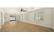Bright living room featuring wood floors and a sliding glass door at 1036 E Glenn Dr, Phoenix, AZ 85020