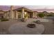 House exterior with backyard patio and fire pit at 11003 E Turnberry Rd, Scottsdale, AZ 85255