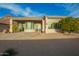 House exterior with large patio and mountain views at 11003 E Turnberry Rd, Scottsdale, AZ 85255