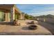 House exterior with flagstone patio and fire pit at 11003 E Turnberry Rd, Scottsdale, AZ 85255