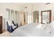Spacious bedroom with large window and comfortable seating at 11003 E Turnberry Rd, Scottsdale, AZ 85255