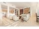 Open floor plan showing kitchen, living room and built-in shelving at 11003 E Turnberry Rd, Scottsdale, AZ 85255