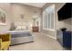 Guest bedroom with a comfortable bed and built-in shelving at 11509 E Beck Ln, Scottsdale, AZ 85255