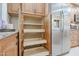 Open kitchen cabinets and drawers with wood shelving at 13816 N 109Th Ave, Sun City, AZ 85351