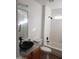 Clean bathroom with black vessel sink and bathtub at 14371 W Morning Star Trl, Surprise, AZ 85374