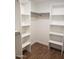 Large walk-in closet with double hanging rods and shelving at 14371 W Morning Star Trl, Surprise, AZ 85374
