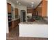Spacious kitchen with an island and stainless steel appliances at 14371 W Morning Star Trl, Surprise, AZ 85374
