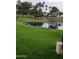 Picturesque lake and golf course view at 14371 W Morning Star Trl, Surprise, AZ 85374