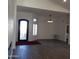 Spacious living area with hardwood floors and high ceilings at 14371 W Morning Star Trl, Surprise, AZ 85374