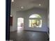 Open living area with backyard access and high ceilings at 14371 W Morning Star Trl, Surprise, AZ 85374
