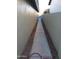 Long side yard with a concrete pathway between walls at 14371 W Morning Star Trl, Surprise, AZ 85374