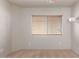Bright bedroom with neutral walls and carpet at 15491 W Amelia Dr, Goodyear, AZ 85395