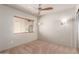 Bright bedroom with neutral colored walls at 15491 W Amelia Dr, Goodyear, AZ 85395