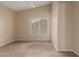 Bright bedroom with tile floors and a ceiling fan at 15491 W Amelia Dr, Goodyear, AZ 85395