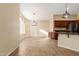 Spacious dining area with wood cabinets and tile floors at 15491 W Amelia Dr, Goodyear, AZ 85395