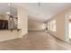 Open concept kitchen features granite countertops and stainless steel appliances at 15491 W Amelia Dr, Goodyear, AZ 85395
