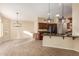 Kitchen boasts granite countertops and dark wood cabinets at 15491 W Amelia Dr, Goodyear, AZ 85395